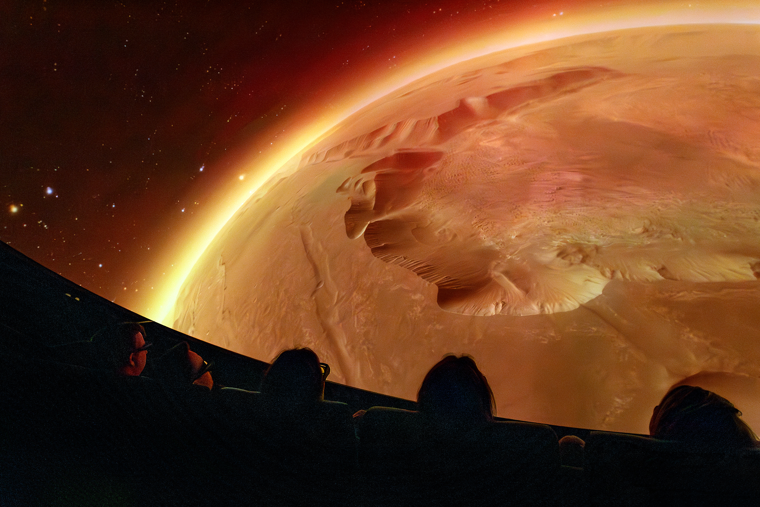 3D screen showing a red planet in closeup.