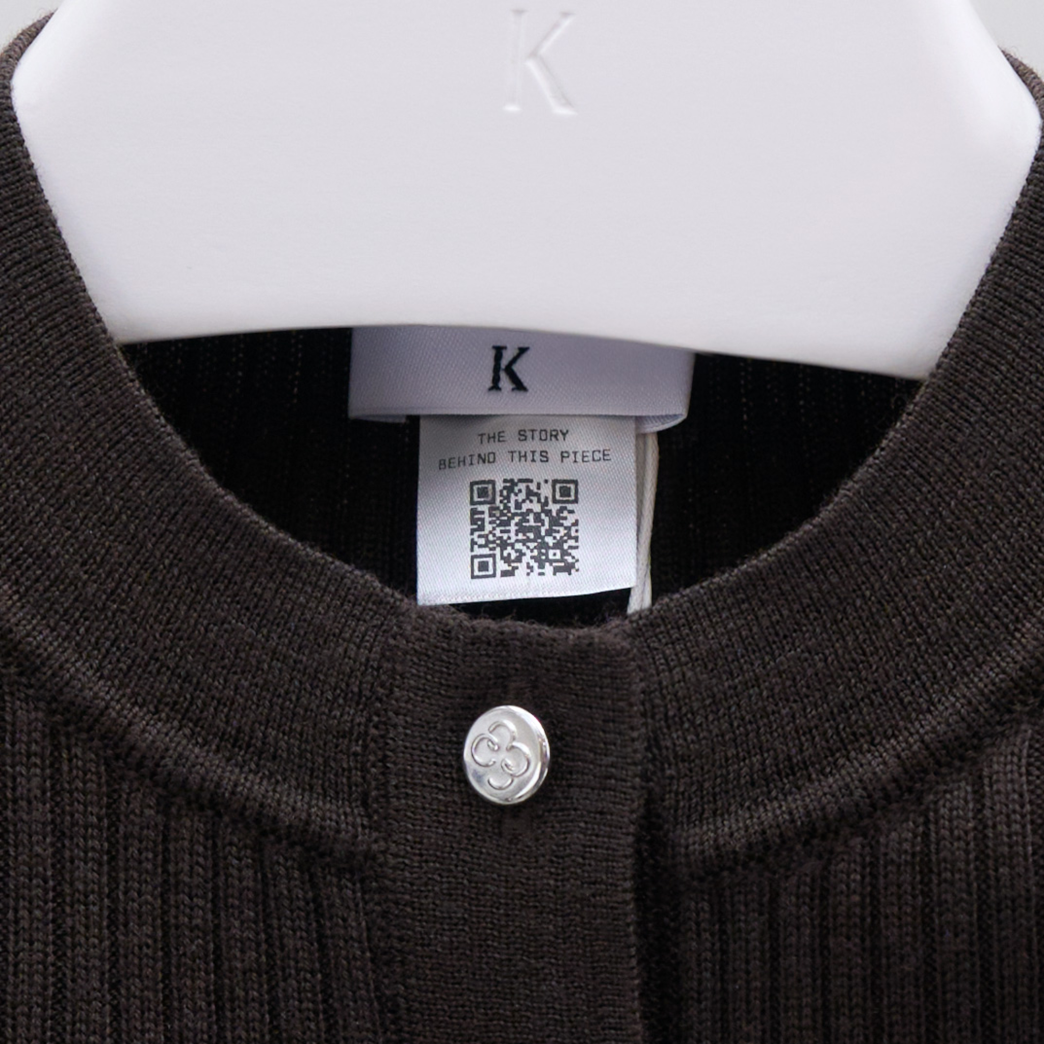 A QR code tag on a sweater.