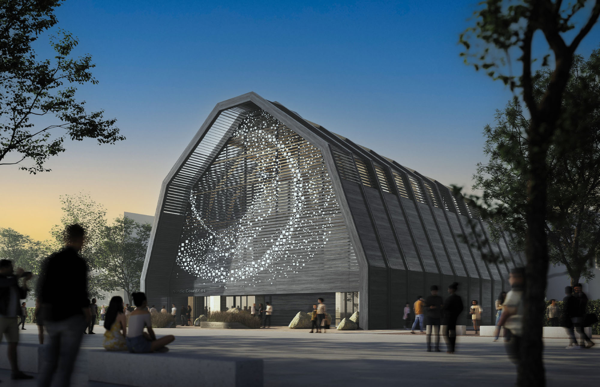 A modern barn-like building in grey wood.