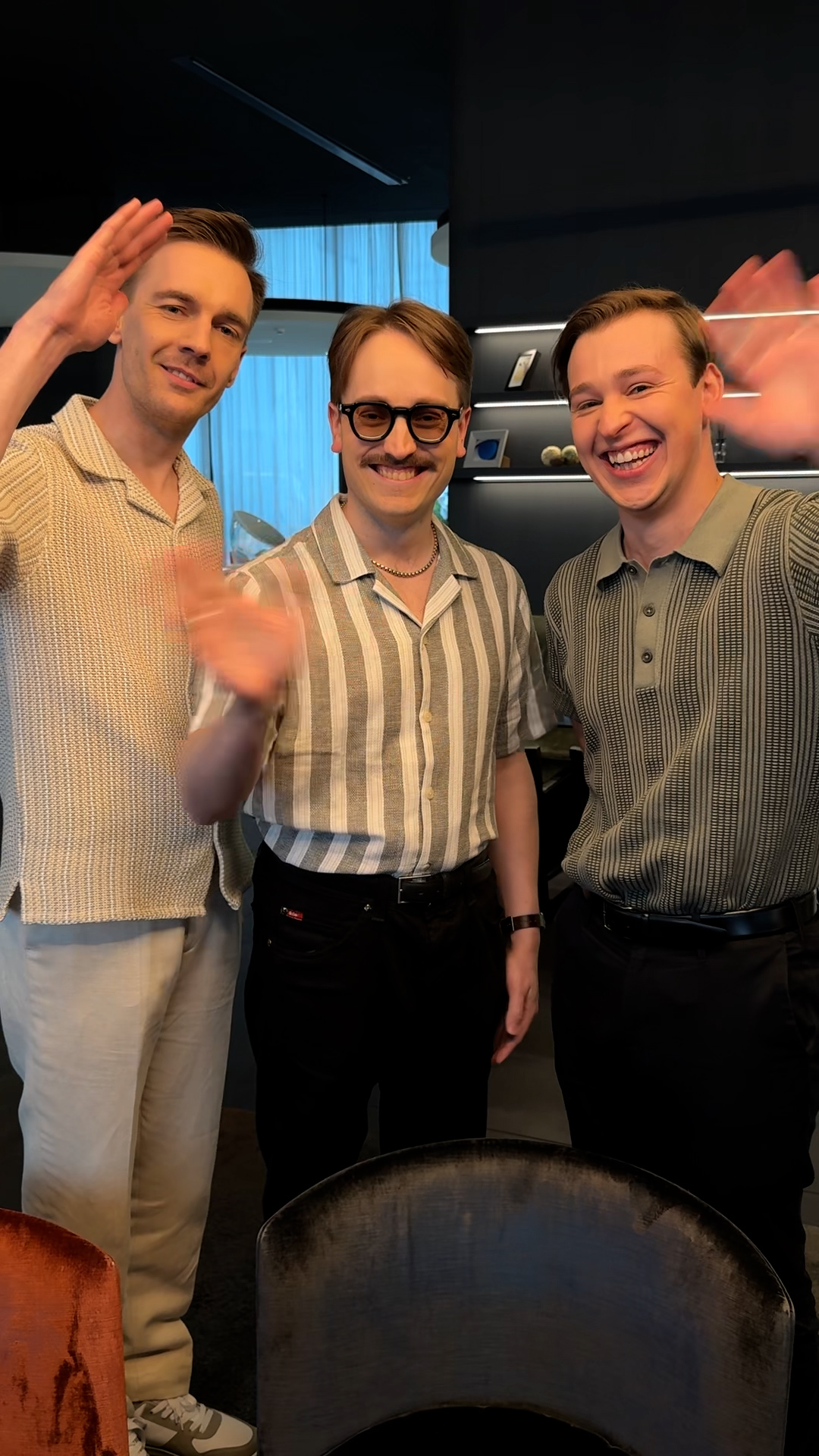 The three members of KAJ waving