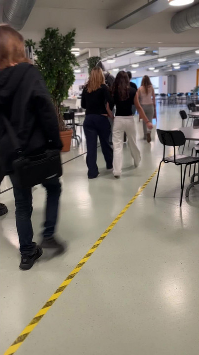 Students going to a classroom.